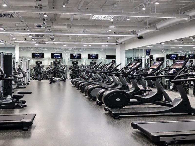 High-tech treadmill console with integrated biometric sensors and dynamic display